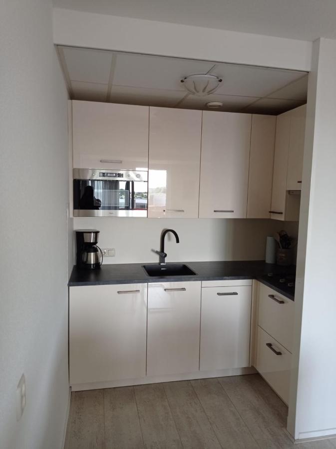 Appartement Ijsselmeer Makkum Strand Bagian luar foto