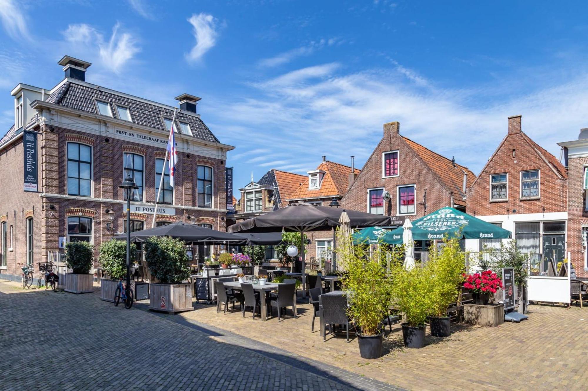 Appartement Ijsselmeer Makkum Strand Bagian luar foto